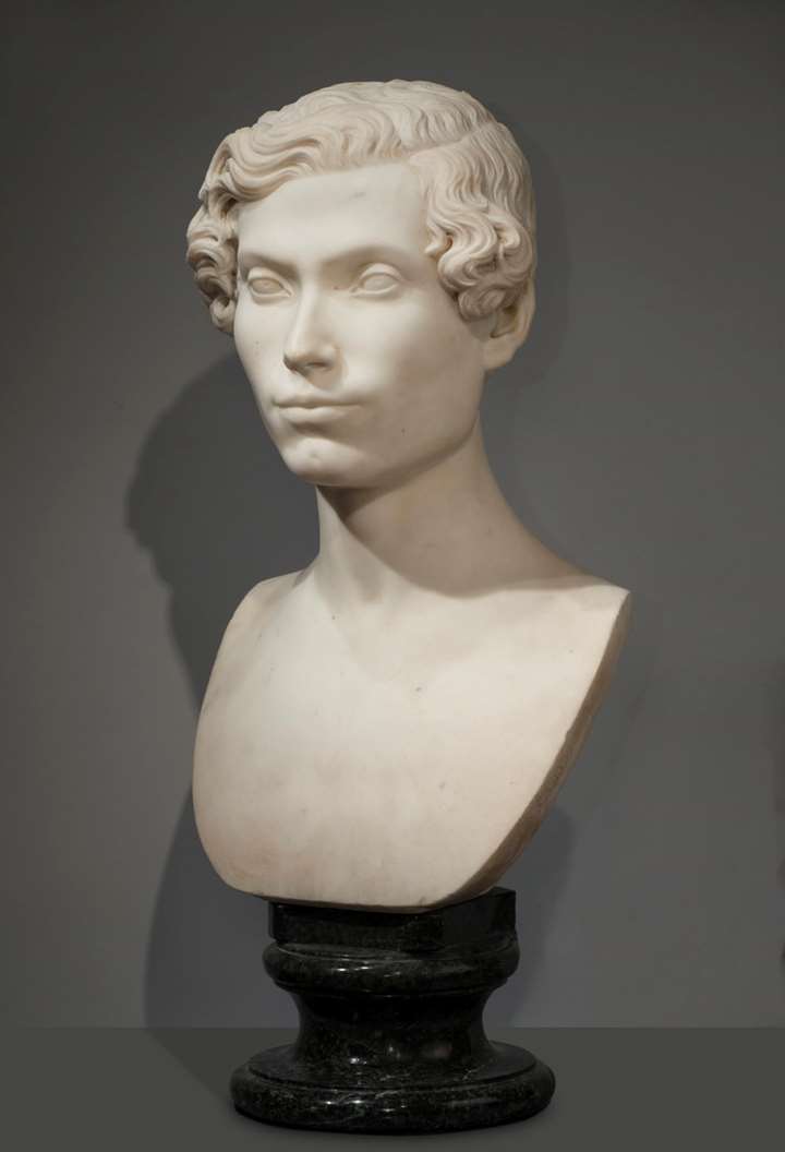 White marble bust of nobleman, on the original verde arno marble base